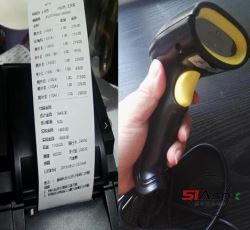 小票和扫描枪.jpg 小票和扫描枪.jpg